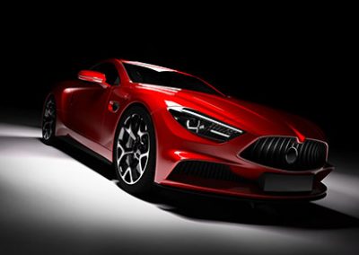 Modern red sports car in a spotlight on a black background.
